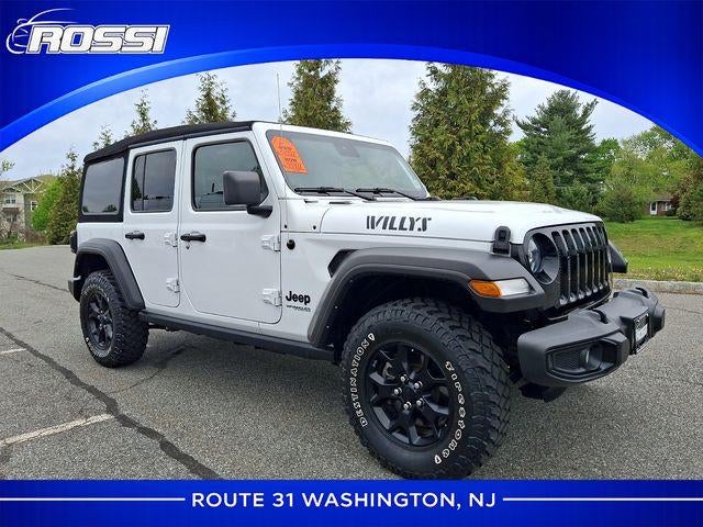 2022 Jeep Wrangler Unlimited Willys 4x4 in Bright White Clearcoat — front three-quarter view