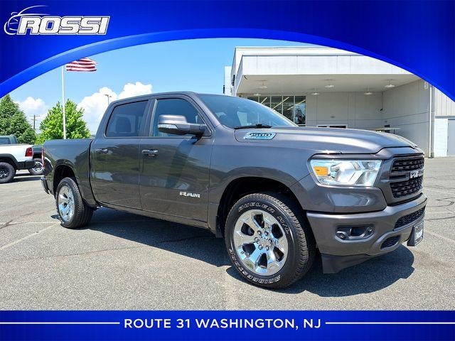 2022 RAM 1500 Big Horn 4x4 Crew Cab 5'7" Box in Granite Crystal Metallic Clearcoat — front three-quarter view