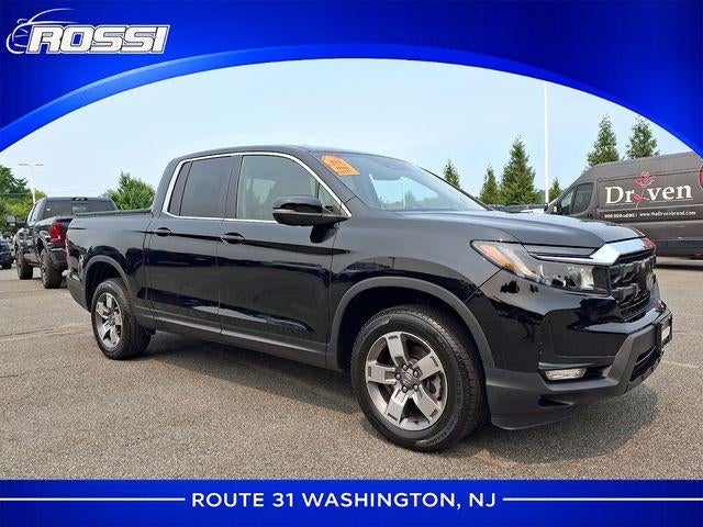 2024 Honda Ridgeline RTL AWD in Black — front three-quarter view