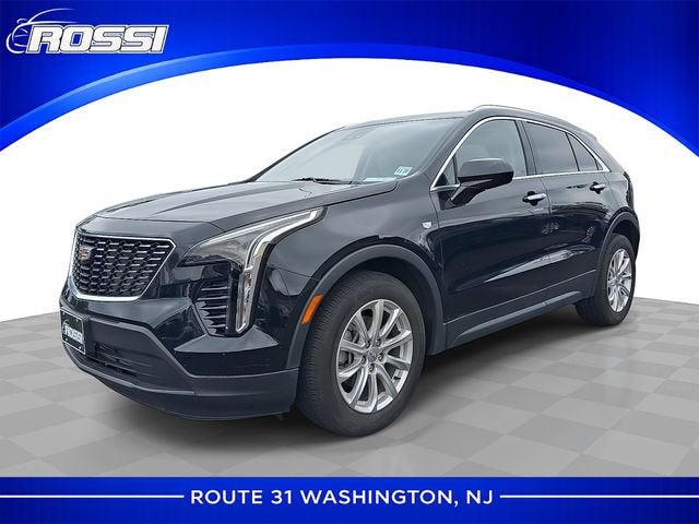 2023 Cadillac XT4 Luxury in Stellar Black Metallic — front three-quarter view