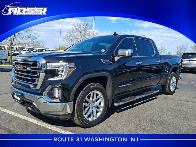 2021 GMC Sierra 1500 SLT in Ebony Twilight Metallic — front three-quarter view